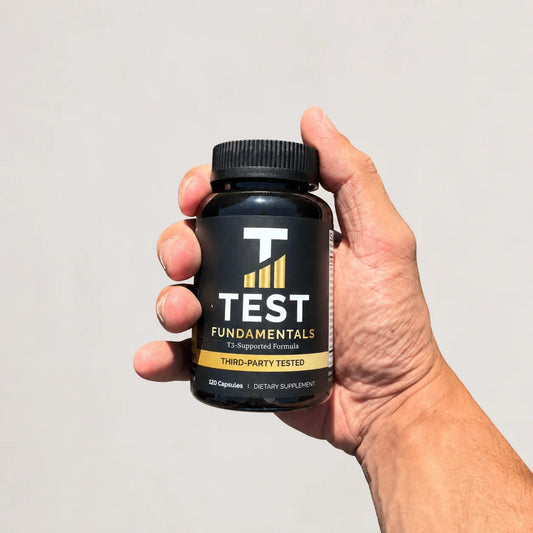 The Test Fundamentals T3 bottle held in a hand, showing its actual size